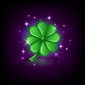 Green four-leaf clover with sparkles, luck symbol, slot icon for online casino or logo for mobile game on dark Royalty Free Stock Photo