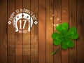 Green Four Leaf Clover on Wood