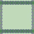 Green frame with a border of green stripes with vegetable ornament in the form of bright green leaves of plants on a blue