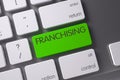 Green Franchising Button on Keyboard. 3D Illustration.