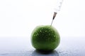 apple with syringe isolated on white background Royalty Free Stock Photo