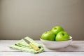 Green fresh apples on wooden table Royalty Free Stock Photo