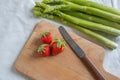 Green fresh asparagus with a bunch of healthy strawberries Royalty Free Stock Photo