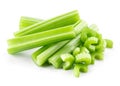Green fresh celery sticks and pieces isolated on white Royalty Free Stock Photo
