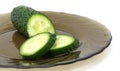 Green fresh cucumber sliced on glass plate Royalty Free Stock Photo