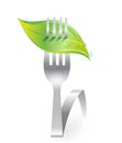 Green fresh leaf on fork