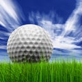 Green, fresh and natural 3d conceptual grass over a blue sky background with a golf ball Royalty Free Stock Photo