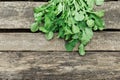 Green fresh organic spinach leaves straight from the garden.wooden backdrop.growing vegetables, healthy lifestyle Royalty Free Stock Photo