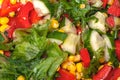 Green fresh salad. Salad with corn, red sweet pepper, cucumber and lettuce. Concept for healthy nutrition close up Royalty Free Stock Photo