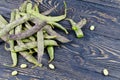 Green fresh soybeans on wood background