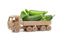 Green, fresh squash truck driving to a farmers market. Royalty Free Stock Photo