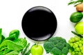 Green fresh vegetables, fruits and plate for healthy salad white background top view mock up Royalty Free Stock Photo