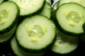 Green freshness a close up of a cucumber slice in a bowl