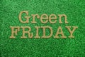 Green Friday alphabet letter on green glitter background