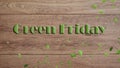 Green Friday concept. Text Green Friday on the wooden background