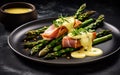 green fried asparagus, bacon, and fried potatoes with mustard sauce on a white plate.