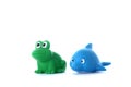 Green frog and blue dolphin children's toys