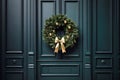 Green front door with Christmas wreath and street festive decorations on holidays Royalty Free Stock Photo