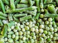 Green frozen beans and peas. Closeup frozen cut green french bean, haricot vert. Vegetable food background, healthy vegetarian