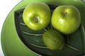 Green fruits on plates