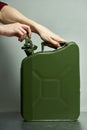 Green fuel container jerrycan isolaed.canister for gasoline, diesel gas.Fire resistant storage tank. Royalty Free Stock Photo