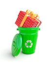 Green garbage bin with present Royalty Free Stock Photo