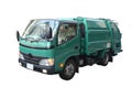 Green garbage truck. Royalty Free Stock Photo