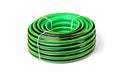 Green garden hose isolated on white. Royalty Free Stock Photo