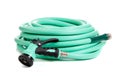 Green garden hose on a white background Royalty Free Stock Photo