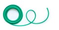 Green garden hose on white background Royalty Free Stock Photo