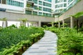 Green garden in the inner yard of residential building complex Royalty Free Stock Photo