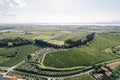 Green gardens and fields around ancient villas near Lake Garda. Verona, Italy. Aerial view