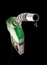 Green gas nozzle with one last drop Royalty Free Stock Photo