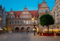 Green gate at Dluga Street in the old city center at nightin. Gdansk, Poland Royalty Free Stock Photo