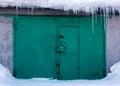 Green gates in snow