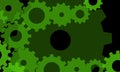 Green gears on a black background
