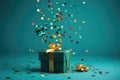 Green gift box with a bow on festive background with splash of golden confetti.. Royalty Free Stock Photo