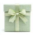 A green gift box with a bow is isolated on a white background Royalty Free Stock Photo