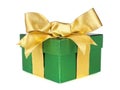 Green gift box wrapped with gold bow and ribbon isolated on white Royalty Free Stock Photo