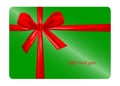 Green gift card with red ribbon Royalty Free Stock Photo