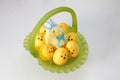 glass easter basket, with chick eggs, and fuzzy chicken disguised as bunny