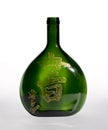 Green glass bottle with hieroglyph Royalty Free Stock Photo