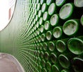 Green glass bottle wall Royalty Free Stock Photo