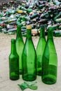 Green glass bottles recycling yard Royalty Free Stock Photo