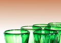 Green glass designer wine glasses detail view abstract with copy space Royalty Free Stock Photo