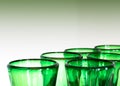 Green glass designer wine glasses detail view abstract with copy space Royalty Free Stock Photo