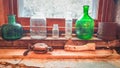 Green Glass Jars on a Windowsill