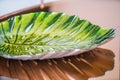 Leaf shaped decorative glass bowl