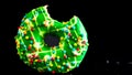 Green glazed donut with sprinkles isolated. Close up of colorful bitten donut Royalty Free Stock Photo