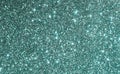 Green glitter background, festive sparkle  texture. Xmas, holiday, party abstract backdrop Royalty Free Stock Photo